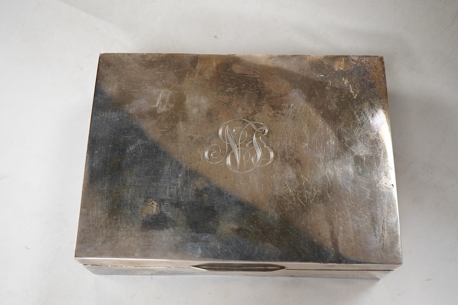 A George V silver mounted rectangular cigarette box, Sampson Mordan & Co, London, 1931, 17cm, with engraved monogram to the cover.